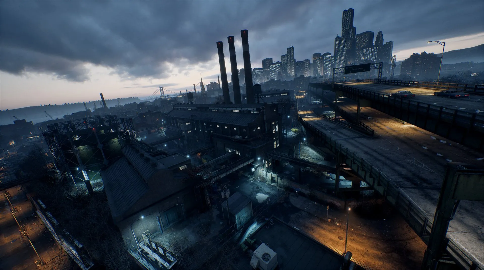 Nighttime overview of Tyndalston with illuminated roads, industrial buildings, and the skyline.
